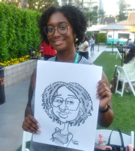 Caricature artist drawing guests at a los angeles corporate event