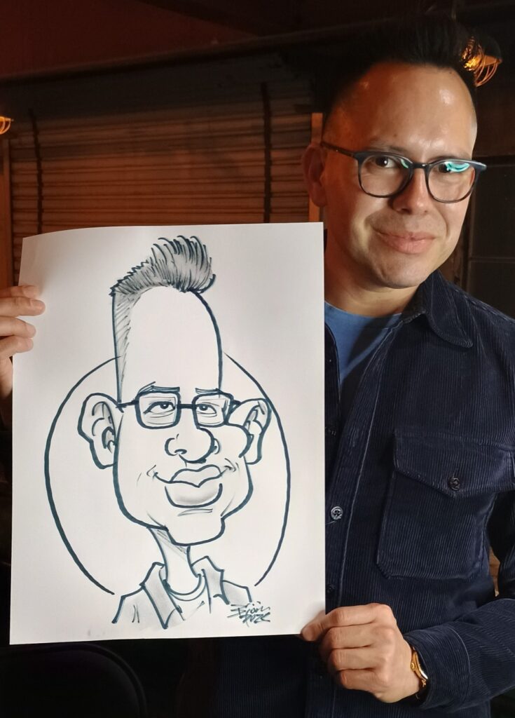 Professional wedding caricature artist creating live portraits for guests in San Diego