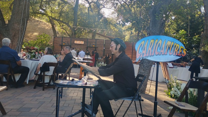 Wedding Caricature Artist San Diego drawing guests at Circle Oak Ranch Fallbrook San Diego